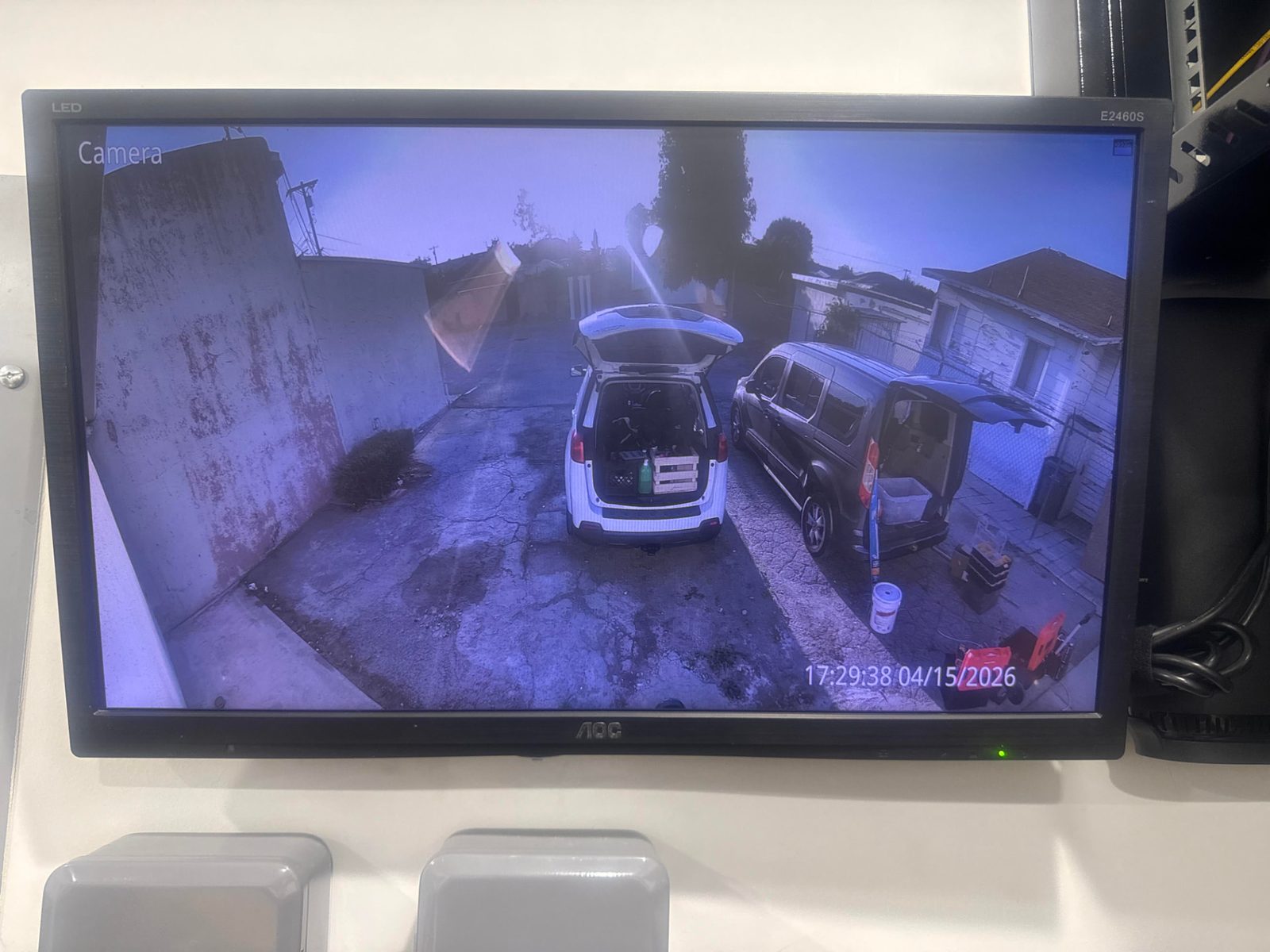 ISEEU TECHS installation: live security camera feed of a driveway shown on a monitoring display